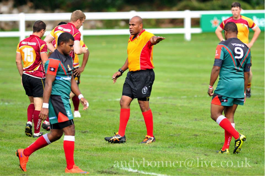 Tyson, a new referee showing he can control the game in a Fijian relaxed style.